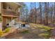 Spacious backyard with a patio and lush landscaping at 125 Tall Timber Ct, Fayetteville, GA 30215