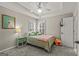 Serene bedroom featuring soft carpet, a trey ceiling, and a window with white shutters at 125 Tall Timber Ct, Fayetteville, GA 30215