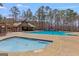 The community pool area includes a large pool, hot tub, and covered seating, perfect for relaxation at 125 Tall Timber Ct, Fayetteville, GA 30215