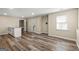 Versatile flex space featuring ample natural light and wood flooring at 125 Tall Timber Ct, Fayetteville, GA 30215