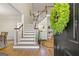 Elegant foyer with a grand staircase, hardwood floors, and natural light at 125 Tall Timber Ct, Fayetteville, GA 30215