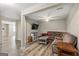 Inviting living room with a plush sofa, TV, and stylish decor at 125 Tall Timber Ct, Fayetteville, GA 30215