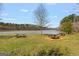 The lakeside picnic area provides a scenic spot for outdoor meals and gatherings at 125 Tall Timber Ct, Fayetteville, GA 30215