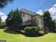 Beautiful backyard showcasing deck and mature trees at 2741 Willowstone Dr, Duluth, GA 30096