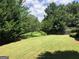 A sprawling green lawn featuring manicured lawn at 2741 Willowstone Dr, Duluth, GA 30096