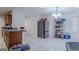 Bright kitchen featuring tiled floors, stainless steel appliances, and lots of storage at 1942 Grove Way, Hampton, GA 30228