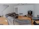 Inviting living room with wood flooring, a fan, and comfortable seating at 1942 Grove Way, Hampton, GA 30228