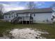 Rear exterior featuring a deck and the home's light blue siding at 1694 Social Circle Fairplay Rd, Social Circle, GA 30025