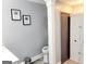 Cozy bathroom featuring a toilet, storage cabinet, and tastefully decorated walls at 3213 Sweetbriar Dr, Villa Rica, GA 30180