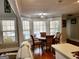 Dining area with bay window and hardwood floors at 3213 Sweetbriar Dr, Villa Rica, GA 30180
