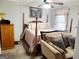 Spacious bedroom featuring neutral decor and a cozy seating area at 3213 Sweetbriar Dr, Villa Rica, GA 30180