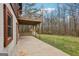 Back patio of home featuring wood deck, and wooded views at 1266 Martin Mill Rd, Moreland, GA 30259