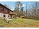 Backyard with a storage shed and patio at 1266 Martin Mill Rd, Moreland, GA 30259