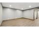 Spacious finished basement area with recessed lighting and wood-look flooring at 1266 Martin Mill Rd, Moreland, GA 30259