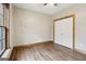 Bedroom featuring hardwood flooring, window, base trim and a closet at 1266 Martin Mill Rd, Moreland, GA 30259