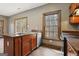 Kitchen with stainless steel dishwasher, double sink, laminate countertop, and natural lighting at 1266 Martin Mill Rd, Moreland, GA 30259