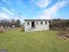 A grassy backyard offers space for outdoor activities at 1683 Candler Rd, Decatur, GA 30032