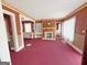 Open-concept living space with fireplace and built-ins at 1683 Candler Rd, Decatur, GA 30032