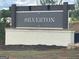 Elegant community sign with stone base, showcasing the 'Silverton' name in a welcoming residential neighborhood at 166 Silverton Dr, Dacula, GA 30019