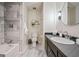 Bathroom features a shower over bath with tiled walls and modern vanity at 2431 Weatherford Ct, Marietta, GA 30068