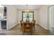 Formal dining room featuring a chandelier, wood floors and natural light at 2431 Weatherford Ct, Marietta, GA 30068