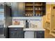 Charming kitchen featuring custom cabinets, a modern coffee station and tile backsplash at 2431 Weatherford Ct, Marietta, GA 30068