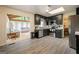 Modern kitchen with stainless steel appliances, and wood floors at 2431 Weatherford Ct, Marietta, GA 30068