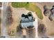 Expansive aerial view showcasing the home's layout, spacious yard, mature trees, and private driveway at 408 Tomahawk Trl, Mcdonough, GA 30252
