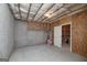 Unfinished basement with storage and brick walls, ready for your personalization at 408 Tomahawk Trl, Mcdonough, GA 30252