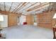 Spacious unfinished basement with open layout, perfect for creating a recreation or storage area at 408 Tomahawk Trl, Mcdonough, GA 30252