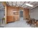 Unfinished basement with storage shelving and open layout, ready for customization at 408 Tomahawk Trl, Mcdonough, GA 30252