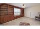 The bonus room features custom built-in bookshelves and a window seat, perfect for reading or relaxing at 408 Tomahawk Trl, Mcdonough, GA 30252