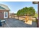 Wide wooden deck offering peaceful views and comfortable outdoor living space at 408 Tomahawk Trl, Mcdonough, GA 30252