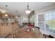 Open concept eat-in kitchen and living area at 408 Tomahawk Trl, Mcdonough, GA 30252