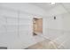 Walk-in closet with adjustable wire shelving and storage solutions at 408 Tomahawk Trl, Mcdonough, GA 30252