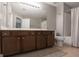 Well-lit bathroom with a large vanity, neutral colors, and a shower-tub combination at 1383 Dolcetto Nw Trce # 9, Kennesaw, GA 30152