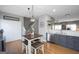 Charming kitchen featuring stainless steel appliances and a cozy breakfast table at 1383 Dolcetto Nw Trce # 9, Kennesaw, GA 30152