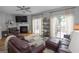 Comfortable living room featuring a fireplace, and sliding doors to outdoor deck at 1383 Dolcetto Nw Trce # 9, Kennesaw, GA 30152