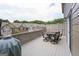 Back deck features outdoor seating area with table, chairs, and grill at 1383 Dolcetto Nw Trce # 9, Kennesaw, GA 30152