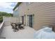 Back deck features outdoor seating area with table, chairs, and grill at 1383 Dolcetto Nw Trce # 9, Kennesaw, GA 30152