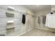 Spacious walk-in closet with adjustable shelving for efficient storage and organization at 1716 Goodwin Dr # 76, Hampton, GA 30228