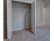 Walk-in closet with wire shelving and open doorway to hallway at 1716 Goodwin Dr, Hampton, GA 30228