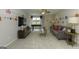 An entertainment room with a stylish couch, a sleek TV, and playful accents offers relaxation at 1716 Goodwin Dr, Hampton, GA 30228