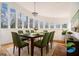 Dining room featuring a table set for eight in a room with abundant natural light at 3365 Turtle Lake Se Dr, Marietta, GA 30067