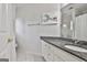 Bathroom features white cabinetry, granite countertops, and a shower with white shower curtain at 1133 Astoria Ln, Peachtree City, GA 30269