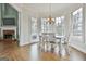 Cozy dining area adjacent to living room with access to outdoor patio at 1133 Astoria Ln, Peachtree City, GA 30269