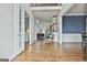 Open-concept foyer featuring hardwood floors, high ceilings and access to multiple rooms at 1133 Astoria Ln, Peachtree City, GA 30269