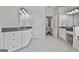 Main bathroom has dual vanities, soaking tub, and access to the main bedroom at 1133 Astoria Ln, Peachtree City, GA 30269