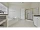 Main bathroom features a soaking tub, glass enclosed shower and lots of light at 1133 Astoria Ln, Peachtree City, GA 30269