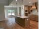 Beautiful kitchen with granite counters, stainless faucet and hardwood floors at 240 Jay Trl, Fayetteville, GA 30215